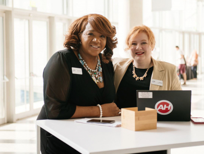 Association Management employees at a table